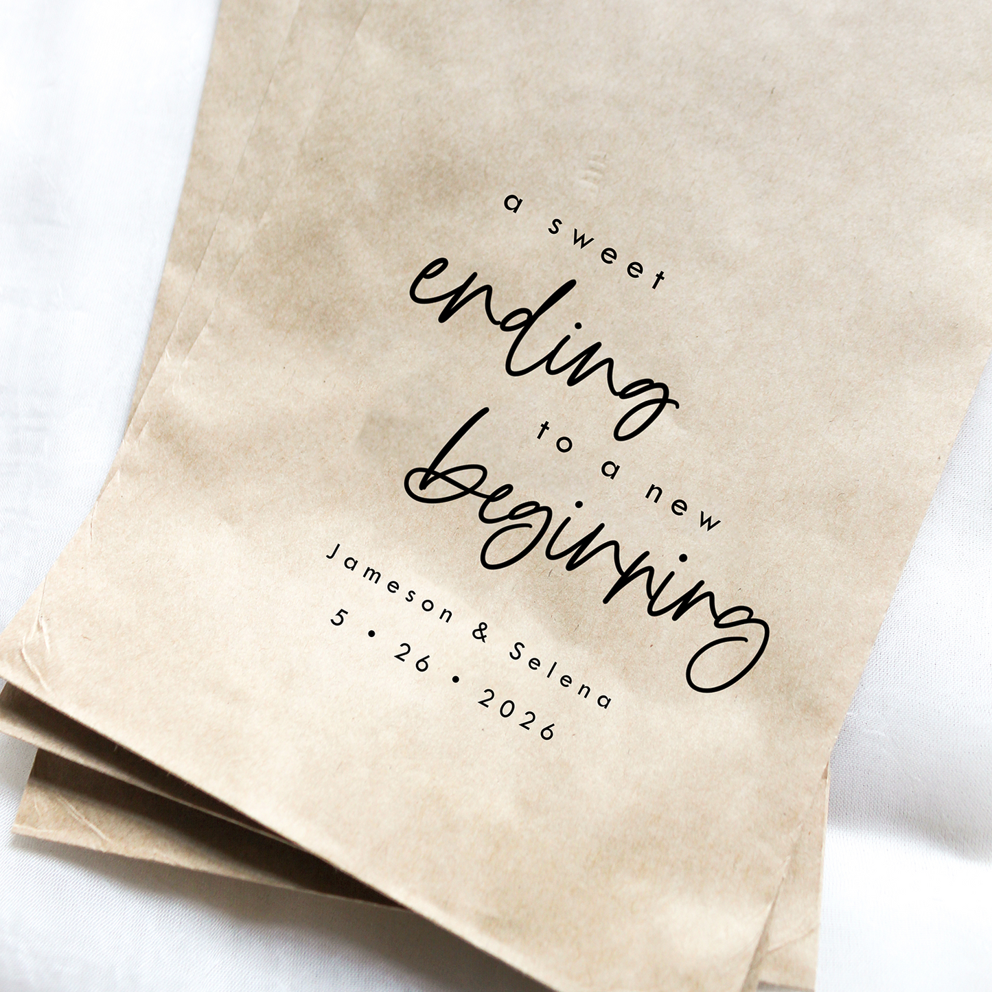 Two brown paper bags with black text on a white background